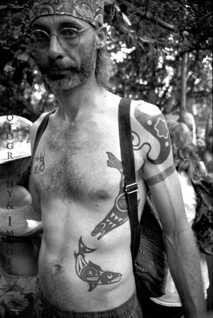 Man with Orca Tattoo.